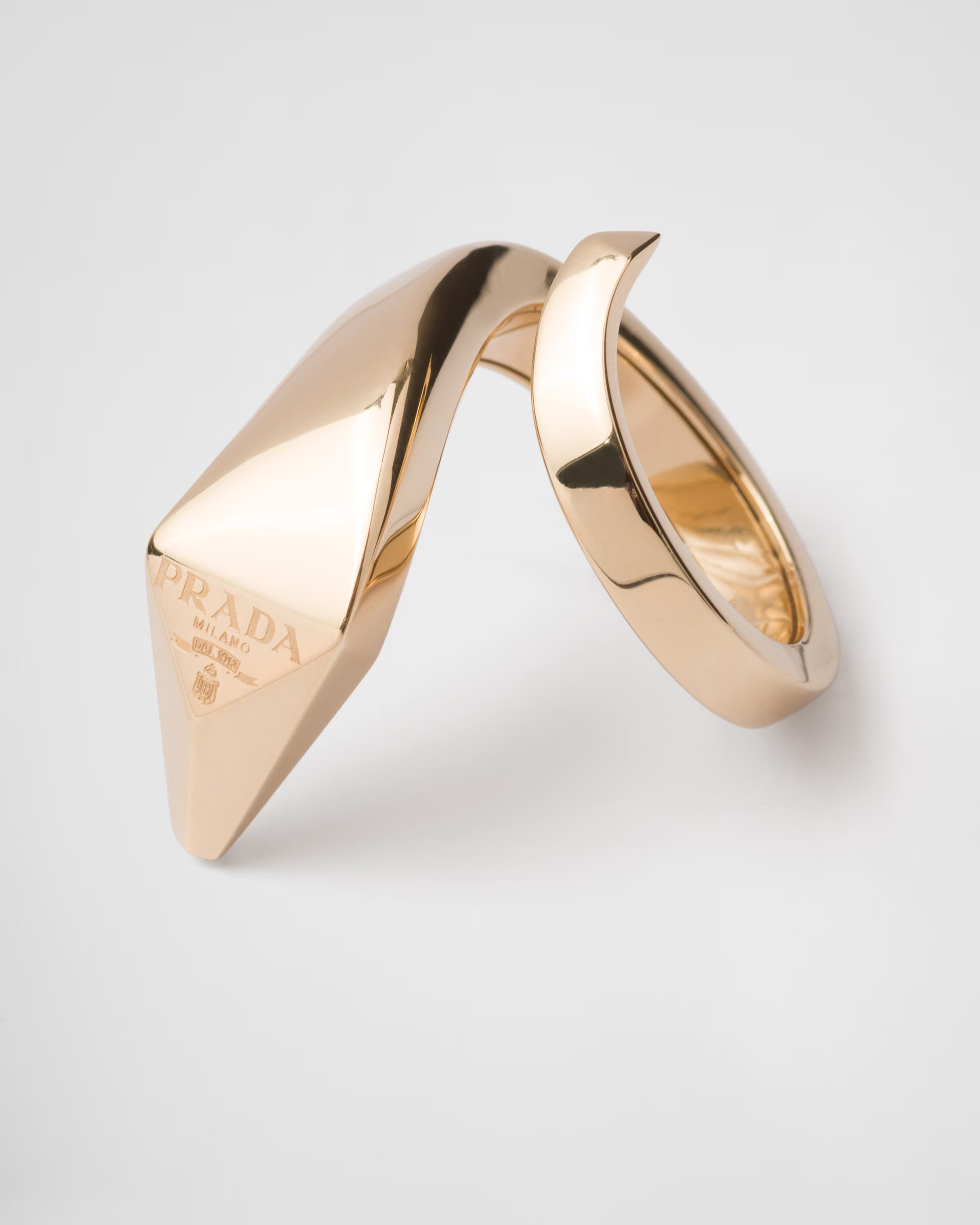 Prada’s bold gold sculptural ring